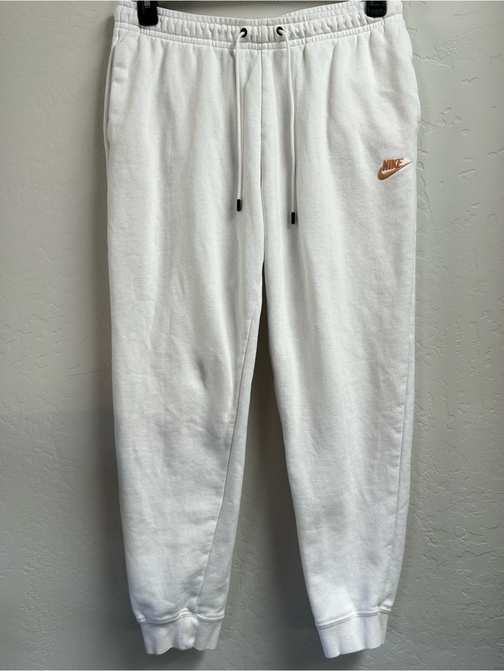 Nike White Joggers with Orange Swoosh
